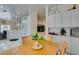 Dining nook next to kitchen featuring a light table set and matching cabinetry at 2180 Tiger Links Dr, Henderson, NV 89012