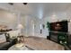 Inviting living room with a tile entryway, plush seating and stylish decor at 2180 Tiger Links Dr, Henderson, NV 89012