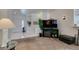 Spacious open-concept living room with sleek tiled floors and seamless flow into other rooms at 2180 Tiger Links Dr, Henderson, NV 89012