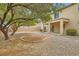 Backyard featuring gravel, desert landscaping and a covered porch at 224 Pioneers Peak Ave, Henderson, NV 89002