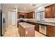 Traditional kitchen with stainless steel appliances, granite countertops, and an island at 224 Pioneers Peak Ave, Henderson, NV 89002