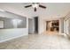 Open-concept living space that leads into the kitchen, with tile floors and neutral walls at 224 Pioneers Peak Ave, Henderson, NV 89002