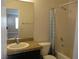 Bathroom featuring single sink vanity with a shower-tub combination at 2381 Lilac Cove St, Las Vegas, NV 89135