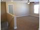 Spacious carpeted bonus room with natural light and a ceiling fan at 2381 Lilac Cove St, Las Vegas, NV 89135