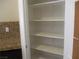 Walk-in pantry with white shelving at 2381 Lilac Cove St, Las Vegas, NV 89135