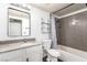 Cozy bathroom features tile surround tub, sleek sink, and decorative mirror at 2451 N Rainbow Blvd # 1016, Las Vegas, NV 89108