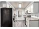 Efficient kitchen with stainless steel appliances, granite countertops, and ample white cabinets for a clean, modern look at 2451 N Rainbow Blvd # 1016, Las Vegas, NV 89108