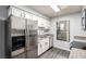 Efficient kitchen with stainless steel appliances, granite countertops, and ample white cabinets for a clean, modern look at 2451 N Rainbow Blvd # 1016, Las Vegas, NV 89108