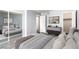Serene main bedroom featuring a mirrored closet, dresser, and calming color palette at 2451 N Rainbow Blvd # 1016, Las Vegas, NV 89108