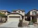 Charming two-story home with a two-car garage and well-maintained landscaping at 258 Bella Matese Ave, Las Vegas, NV 89183