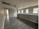 Spacious upper living room featuring plank flooring, and bright natural light at 258 Bella Matese Ave, Las Vegas, NV 89183