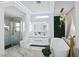 Elegant bathroom with soaking tub, glass enclosed shower, and modern vanity with dual sinks at 2652 Golfside Dr, Las Vegas, NV 89134