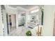 Bright bathroom featuring a modern soaking tub, marble shower, and double sink vanity at 2652 Golfside Dr, Las Vegas, NV 89134