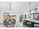 Cozy breakfast nook with great natural light, stylish chandelier and view of the backyard at 2652 Golfside Dr, Las Vegas, NV 89134