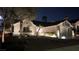 Charming single-story home features a landscaped front yard, accent lighting, and attached two-car garage at 2652 Golfside Dr, Las Vegas, NV 89134