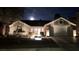 Inviting single-story home with a well-manicured lawn, mature landscaping, and a two-car garage with extra driveway parking at 2652 Golfside Dr, Las Vegas, NV 89134