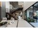 Grand entryway featuring a staircase, high ceilings, and natural light at 2655 Juniper Branch St, Las Vegas, NV 89117