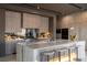 Modern kitchen with sleek cabinetry, a center island, and stainless steel appliances at 2655 Juniper Branch St, Las Vegas, NV 89117