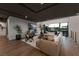 Second-floor living room with hardwood floors, contemporary decor, and an open layout at 2655 Juniper Branch St, Las Vegas, NV 89117