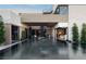 Modern home featuring a stunning zero-edge pool, a spiral staircase, and an open layout with seamless indoor-outdoor living at 2655 Juniper Branch St, Las Vegas, NV 89117