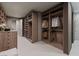 Spacious walk-in closet featuring custom wood shelving and ample storage for clothing and accessories at 2655 Juniper Branch St, Las Vegas, NV 89117