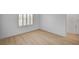 Bedroom with wood floors, white walls and plantation shutters at 2721 Faiss Dr, Las Vegas, NV 89134