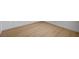 Wood flooring in neutral tones, and a white baseboard at 2721 Faiss Dr, Las Vegas, NV 89134
