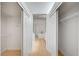 Dual walk-in closets with sliding doors, laminate floor and wire shelving at 2721 Faiss Dr, Las Vegas, NV 89134