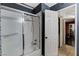 Bathroom features a shower-tub, tile floors, and a shower with a glass door at 2725 S Nellis Blvd # 1052, Las Vegas, NV 89121