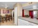 This eat-in kitchen features white cabinetry, sleek countertops, and access to the dining area at 2725 S Nellis Blvd # 1052, Las Vegas, NV 89121