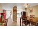 Dining area with wood table and chairs, connecting to a bright kitchen at 2725 S Nellis Blvd # 1052, Las Vegas, NV 89121