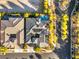 Overhead aerial view of home with pool and spa, solar panels, and manicured landscaping at 28 Tea Olive Dr, Las Vegas, NV 89141