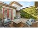 Private courtyard with stone pavers, comfortable seating, and lush greenery for outdoor relaxation at 28 Tea Olive Dr, Las Vegas, NV 89141
