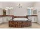 Elegant main bathroom featuring a soaking tub and dual sinks at 28 Tea Olive Dr, Las Vegas, NV 89141