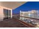 Balcony view showcases the city lights and Westgate hotel at dusk at 2857 Paradise Rd # 2203, Las Vegas, NV 89109