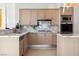 Modern kitchen with sleek cabinetry, stainless steel appliances, and marble countertops and backsplash at 2857 Paradise Rd # 2203, Las Vegas, NV 89109