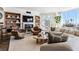Bright living room features a fireplace, herringbone floors, city views, and stylish contemporary decor at 2857 Paradise Rd # 2203, Las Vegas, NV 89109
