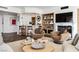 Bright living room features a fireplace, herringbone floors, and modern decor at 2857 Paradise Rd # 2203, Las Vegas, NV 89109