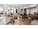 Bright living room features a fireplace, herringbone floors, city views, and stylish contemporary decor at 2857 Paradise Rd # 2203, Las Vegas, NV 89109