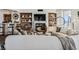 Spacious living room with plush seating, fireplace, built-in shelving, and herringbone floors at 2857 Paradise Rd # 2203, Las Vegas, NV 89109