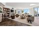 Bright living room features a fireplace, herringbone floors, city views, and stylish contemporary decor at 2857 Paradise Rd # 2203, Las Vegas, NV 89109