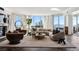 Bright living room features a fireplace, herringbone floors, city views, and stylish contemporary decor at 2857 Paradise Rd # 2203, Las Vegas, NV 89109