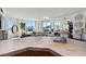 Bright, modern living room with stylish furniture, herringbone floors, bar area, and an amazing city view at 2857 Paradise Rd # 2203, Las Vegas, NV 89109