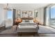 Luxurious bedroom featuring a chandelier, city views, and a neutral color scheme at 2857 Paradise Rd # 2203, Las Vegas, NV 89109