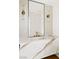 Bathroom featuring marble vanity with modern faucet and decorative lighting at 2937 Billy Casper Dr, Las Vegas, NV 89134