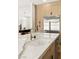 Kitchen with marble countertops, stainless steel refrigerator, and modern lighting at 2937 Billy Casper Dr, Las Vegas, NV 89134