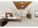 Spacious main bedroom with tray ceiling and ensuite bathroom at 2937 Billy Casper Dr, Las Vegas, NV 89134