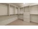 Well-organized walk-in closet featuring ample storage and custom shelving at 2937 Billy Casper Dr, Las Vegas, NV 89134