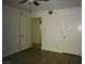 A bedroom with two closets and tiled floors at 3041 Casey Dr # 101, Las Vegas, NV 89120