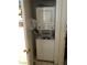 Efficient laundry closet with stacked washer and dryer at 3041 Casey Dr # 101, Las Vegas, NV 89120